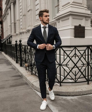 Charcoal Check Tie Outfits For Men: We love how this combo of a black check suit and a charcoal check tie immediately makes a man look sharp and elegant. Get a little creative in the shoe department and add white leather low top sneakers to your ensemble.