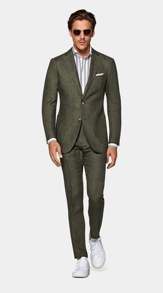 Olive Suit Outfits: An olive suit and a grey vertical striped dress shirt are among the crucial elements of any smart menswear collection. Feeling experimental today? Break up this ensemble by wearing a pair of white canvas low top sneakers.