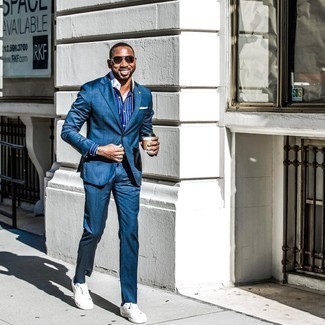 Blue Vertical Striped Dress Shirt Outfits For Men: Try pairing a blue vertical striped dress shirt with a navy suit - this look is bound to make an entrance. You could perhaps get a bit experimental in the shoe department and add white canvas low top sneakers to the mix.