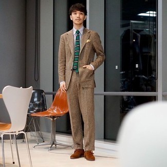 500+ Dressy Warm Weather Outfits For Men: This outfit proves that it is totally worth investing in such timeless menswear items as a brown suit and a white and navy vertical striped dress shirt. If you're wondering how to finish off, a pair of brown suede monks is a savvy option.