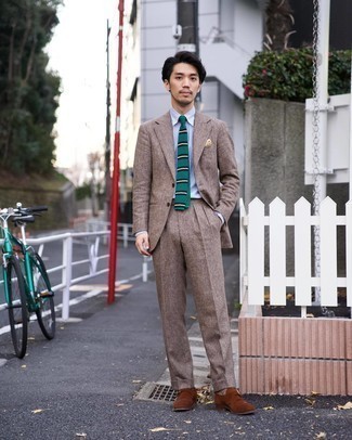 Dark Green Horizontal Striped Tie Outfits For Men: Make a brown suit and a dark green horizontal striped tie your outfit choice for a sharp and sophisticated silhouette. To bring a more casual feel to your ensemble, add a pair of brown suede monks to the mix.