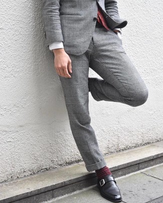 Burgundy Paisley Tie Outfits For Men: Hard proof that a grey plaid suit and a burgundy paisley tie are amazing when matched together in a sophisticated outfit for a modern gentleman. For something more on the daring side to finish off your outfit, complement your look with black leather monks.
