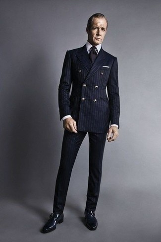 Navy Leather Monks Outfits: Reach for a navy vertical striped suit and a white dress shirt and you'll be the epitome of sophistication. A pair of navy leather monks looks perfect here.