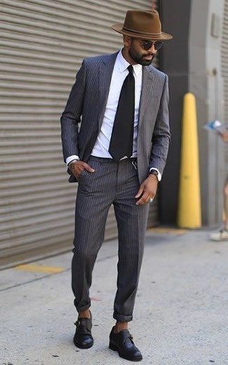 Grey Vertical Striped Suit Outfits: For an ensemble that's smart and envy-worthy, reach for a grey vertical striped suit and a white dress shirt. Look at how nice this outfit is complemented with a pair of black leather monks.