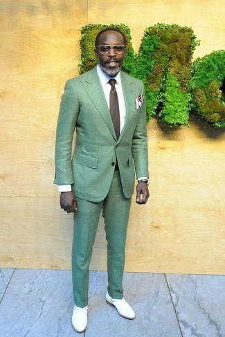 Green Suit Outfits: Consider teaming a green suit with a white dress shirt if you're going for a clean, trendy ensemble. Our favorite of a variety of ways to complement this look is a pair of white leather monks.