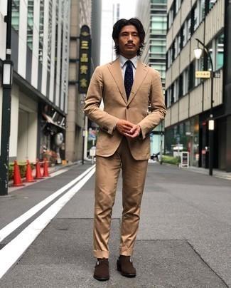 Brown Suede Monks Outfits: A tan suit and a white vertical striped dress shirt are a polished combo that every modern guy should have in his collection. A pair of brown suede monks is a never-failing footwear style that's full of personality.