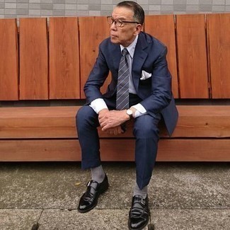 Monks Outfits After 60: This combo of a navy suit and a white dress shirt comes in handy when you need to look seriously stylish and refined. Send this look in a less formal direction with a pair of monks. Looking for dressing tips for gentlemen in their 60s? This combination is great inspiration.