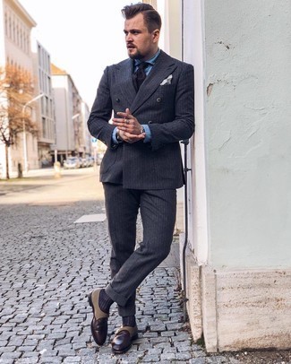 Dark Brown Leather Monks Outfits: This look demonstrates it is totally worth investing in such smart menswear items as a charcoal vertical striped wool suit and a blue chambray dress shirt. If in doubt about the footwear, stick to a pair of dark brown leather monks.