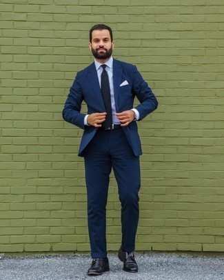 White and Blue Pocket Square Outfits: A navy vertical striped suit and a white and blue pocket square are essential in any modern man's great casual closet. On the shoe front, go for something on the smarter end of the spectrum and round off your getup with black leather monks.