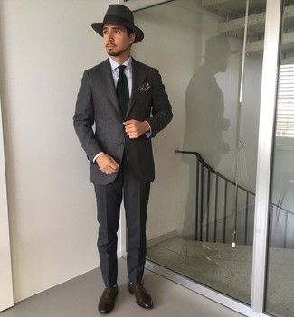 Charcoal Suit Outfits: A charcoal suit and a white dress shirt are worth adding to your list of veritable menswear essentials. Complement this ensemble with dark brown leather oxford shoes et voila, the look is complete.