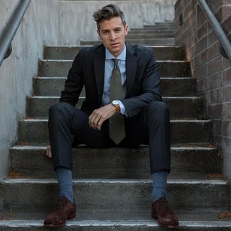 Charcoal Suit Outfits: Pairing a charcoal suit and a light blue dress shirt is a surefire way to inject a classy touch into your wardrobe. Throw in a pair of dark brown suede oxford shoes to tie the whole getup together.