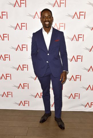 Sterling K. Brown wearing Navy Suit, White Dress Shirt, Dark Brown Leather Oxford Shoes, Red Pocket Square