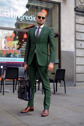 Black Leather Briefcase Outfits: Combining a dark green suit with a black leather briefcase is a savvy option for a laid-back outfit. Complement this ensemble with dark brown leather oxford shoes to instantly change up the ensemble.