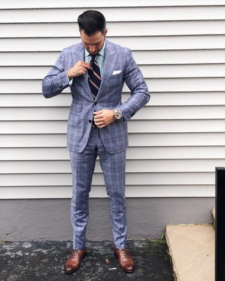 Navy Vertical Striped Tie Dressy Outfits For Men: A light blue plaid suit looks so refined when paired with a navy vertical striped tie in a modern man's look. A pair of brown leather oxford shoes finishes this ensemble quite well.