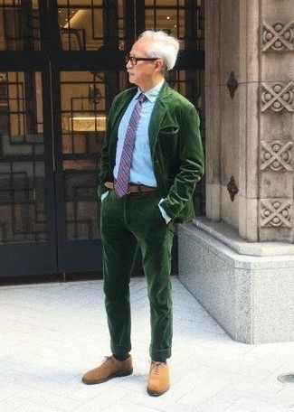 Dark Green Suit Outfits: Combining a dark green suit and a light blue dress shirt is a surefire way to infuse your daily routine with some rugged refinement. Let your outfit coordination prowess really shine by finishing off this look with tobacco suede oxford shoes.