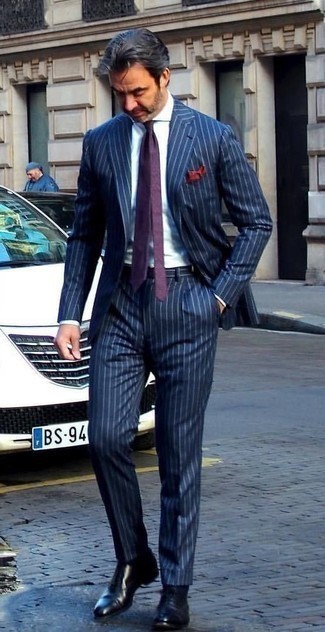 Burgundy Pocket Square Dressy Outfits: Consider teaming a navy vertical striped suit with a burgundy pocket square for a laid-back kind of sophistication. Add black leather oxford shoes to your getup to immediately boost the style factor of any outfit.