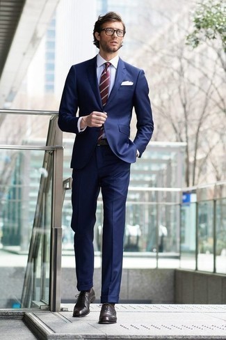 Red Horizontal Striped Tie Outfits For Men: Undeniable proof that a navy suit and a red horizontal striped tie look amazing together in an elegant look for a modern man. A pair of dark brown leather oxford shoes can easily tone down an all-too-refined outfit.