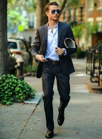 Blue Sunglasses Outfits For Men: You'll be surprised at how easy it is for any gent to put together this off-duty ensemble. Just a charcoal suit and blue sunglasses. To give your overall ensemble a sleeker finish, complement this outfit with a pair of black leather oxford shoes.