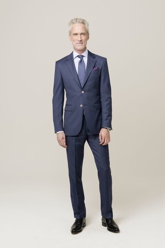 Blue Tie Outfits For Men: We love the way this combination of a navy suit and a blue tie immediately makes men look elegant and dapper. Add black leather oxford shoes to the mix to infuse a hint of stylish effortlessness into this ensemble.