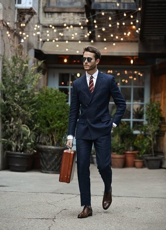 Dark Brown Leather Briefcase Dressy Outfits: Teaming a navy suit with a dark brown leather briefcase is an on-point choice for a casual but sharp look. Why not add dark brown leather oxford shoes to the mix for an element of refinement?