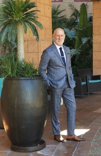 Blue Plaid Suit Outfits: To look like a true dandy with a great deal of class, consider teaming a blue plaid suit with a white dress shirt. Our favorite of a variety of ways to round off this outfit is with brown leather oxford shoes.
