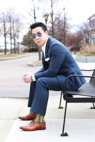 Yellow Socks Outfits For Men: A navy check suit and yellow socks teamed together are the perfect combination for men who love casually stylish styles. You can stick to a classier route in the footwear department by rocking a pair of tobacco leather oxford shoes.