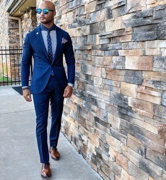 Light Blue Sunglasses Outfits For Men: If it's comfort and practicality that you're searching for in menswear, choose a blue suit and light blue sunglasses. A nice pair of brown leather oxford shoes is an easy way to give a hint of sophistication to your getup.