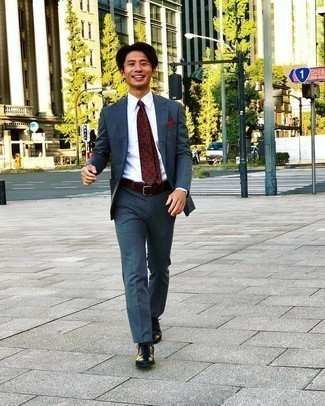 Burgundy Suede Belt Outfits For Men: A navy vertical striped suit and a burgundy suede belt worn together are a match made in heaven for gents who appreciate casual styles. Go ahead and complement this ensemble with a pair of black leather oxford shoes for an extra dose of style.