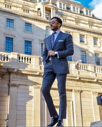 Blue Tie Outfits For Men: A blue check suit and a blue tie are a great combination that will get you a great deal of attention. If you want to instantly dress down your ensemble with one piece, why not add a pair of navy leather oxford shoes to the equation?