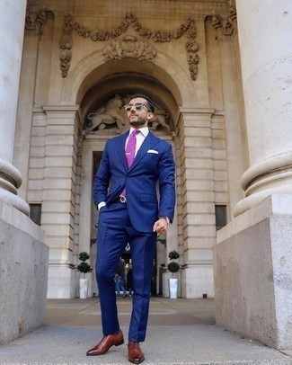 Purple Polka Dot Tie Outfits For Men: Consider wearing a blue check suit and a purple polka dot tie to exude elegance and polish. The whole ensemble comes together when you complement your getup with brown leather oxford shoes.