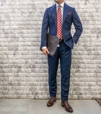 Red Print Tie Outfits For Men: This is irrefutable proof that a navy suit and a red print tie look amazing when matched together in a sophisticated look for a modern gent. Why not take a more relaxed approach with shoes and introduce dark brown leather oxford shoes to the equation?