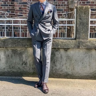 Navy Paisley Tie Outfits For Men: A charcoal vertical striped suit and a navy paisley tie? Be sure, this menswear style will make women swoon. Complete this outfit with a pair of dark brown leather oxford shoes for maximum effect.