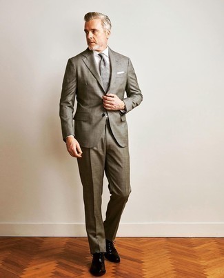 Grey Plaid Tie Outfits For Men: Putting together a grey suit with a grey plaid tie is an on-point pick for a sharp and refined getup. You could perhaps get a little creative in the footwear department and add a pair of black leather oxford shoes to the equation.