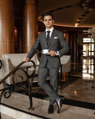 Charcoal Plaid Suit Outfits: You're looking at the hard proof that a charcoal plaid suit and a white dress shirt look amazing when you pair them up in a polished getup for a modern gent. When it comes to shoes, complement your outfit with black leather oxford shoes.