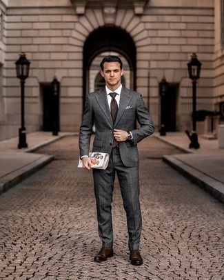 Charcoal Plaid Suit Outfits: This combo of a charcoal plaid suit and a white dress shirt couldn't possibly come across other than seriously dapper and elegant. Consider a pair of dark brown leather oxford shoes as the glue that will tie this ensemble together.