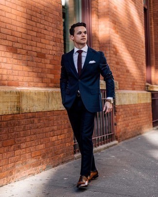 Red Check Tie Outfits For Men: You're looking at the solid proof that a navy suit and a red check tie are awesome when worn together in a polished look for today's man. Go ahead and complement this getup with a pair of brown leather oxford shoes for a hint of stylish nonchalance.