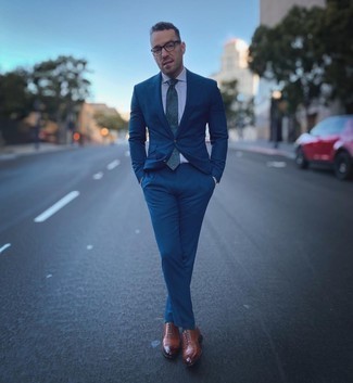 Dark Green Socks Outfits For Men: A blue suit and dark green socks combined together are a match made in heaven. If you need to effortlessly up your look with one single piece, why not enter brown leather oxford shoes into the equation?