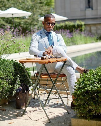 Blue Knit Tie Outfits For Men: Make a navy and white vertical striped seersucker suit and a blue knit tie your outfit choice - this look is bound to make ladies swoon. For extra style points, complete this look with a pair of dark brown suede oxford shoes.