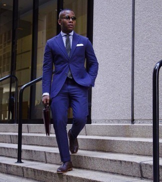 Navy Suit Outfits: A navy suit and a white and navy check dress shirt are absolute wardrobe heroes if you're crafting a polished wardrobe that holds to the highest men's style standards. Add a pair of dark brown leather oxford shoes to the mix and off you go looking incredible.