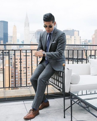 Blue Horizontal Striped Socks Outfits For Men: Why not try pairing a charcoal suit with blue horizontal striped socks? As well as very functional, these two pieces look great together. And if you wish to easily rev up this outfit with one piece, complement this ensemble with brown leather oxford shoes.