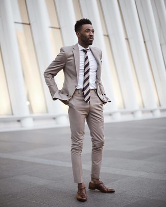Black and White Pocket Square Outfits: One of the coolest ways for a man to style out a beige suit is to marry it with a black and white pocket square in an off-duty combination. Take a more polished approach with shoes and add a pair of brown leather oxford shoes to the mix.