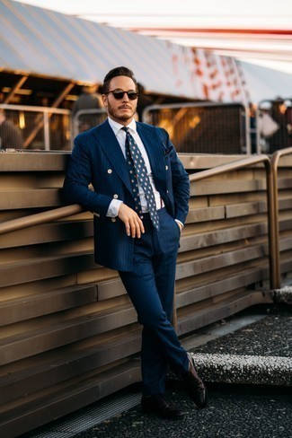 Tobacco Leather Oxford Shoes Outfits: Marrying a navy vertical striped suit and a white dress shirt is a fail-safe way to infuse style into your current styling rotation. Introduce tobacco leather oxford shoes to your outfit and you're all set looking boss.