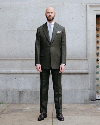Olive Wool Suit Outfits: Try pairing an olive wool suit with a white dress shirt if you're going for a proper, sharp outfit. If in doubt about the footwear, go with dark brown leather oxford shoes.