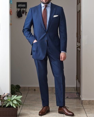 Tobacco Polka Dot Tie Outfits For Men: Marry a navy suit with a tobacco polka dot tie to look smooth and dapper. Take an otherwise standard ensemble in a more laid-back direction by rocking brown leather oxford shoes.