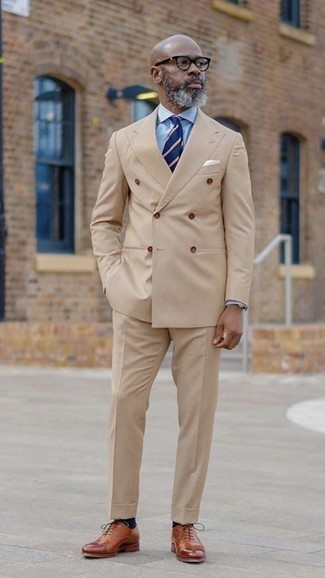 Navy Horizontal Striped Tie Outfits For Men: To look smooth and stylish, wear a tan suit and a navy horizontal striped tie. You could perhaps get a little creative in the shoe department and complete this ensemble with a pair of brown leather oxford shoes.