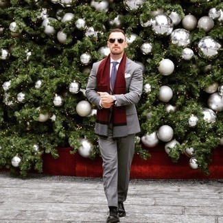 Burgundy Scarf Outfits For Men: The pairing of a grey vertical striped suit and a burgundy scarf makes this a solid off-duty ensemble. Hesitant about how to round off this look? Wear a pair of black leather oxford shoes to bump it up.