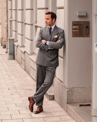 Grey Suit with Brown Oxford Shoes Outfits: This combo of a grey suit and a white and blue vertical striped dress shirt can only be described as ridiculously dapper and elegant. Brown oxford shoes tie the look together.