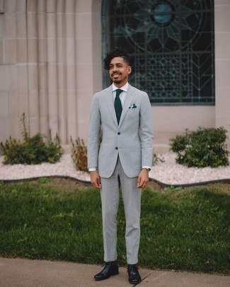 Men's Outfits 2021: One of our favorite ways to style out such a timeless menswear item as a grey suit is to combine it with a grey vertical striped dress shirt. Complete this look with black leather oxford shoes for extra fashion points.