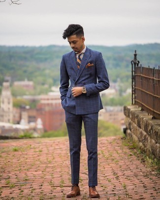 Brown Pocket Square Outfits: This pairing of a navy check suit and a brown pocket square is extremely easy to do and so comfortable to rock a version of all day long as well! A pair of brown leather oxford shoes effortlessly kicks up the wow factor of any getup.