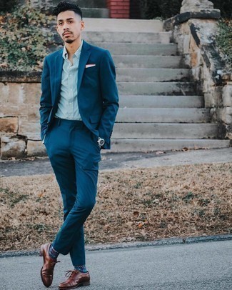 Watch Outfits For Men: A navy suit and a watch are certainly worth being on your list of essential casual pieces. And if you need to easily kick up your outfit with shoes, add a pair of dark brown leather oxford shoes to the equation.